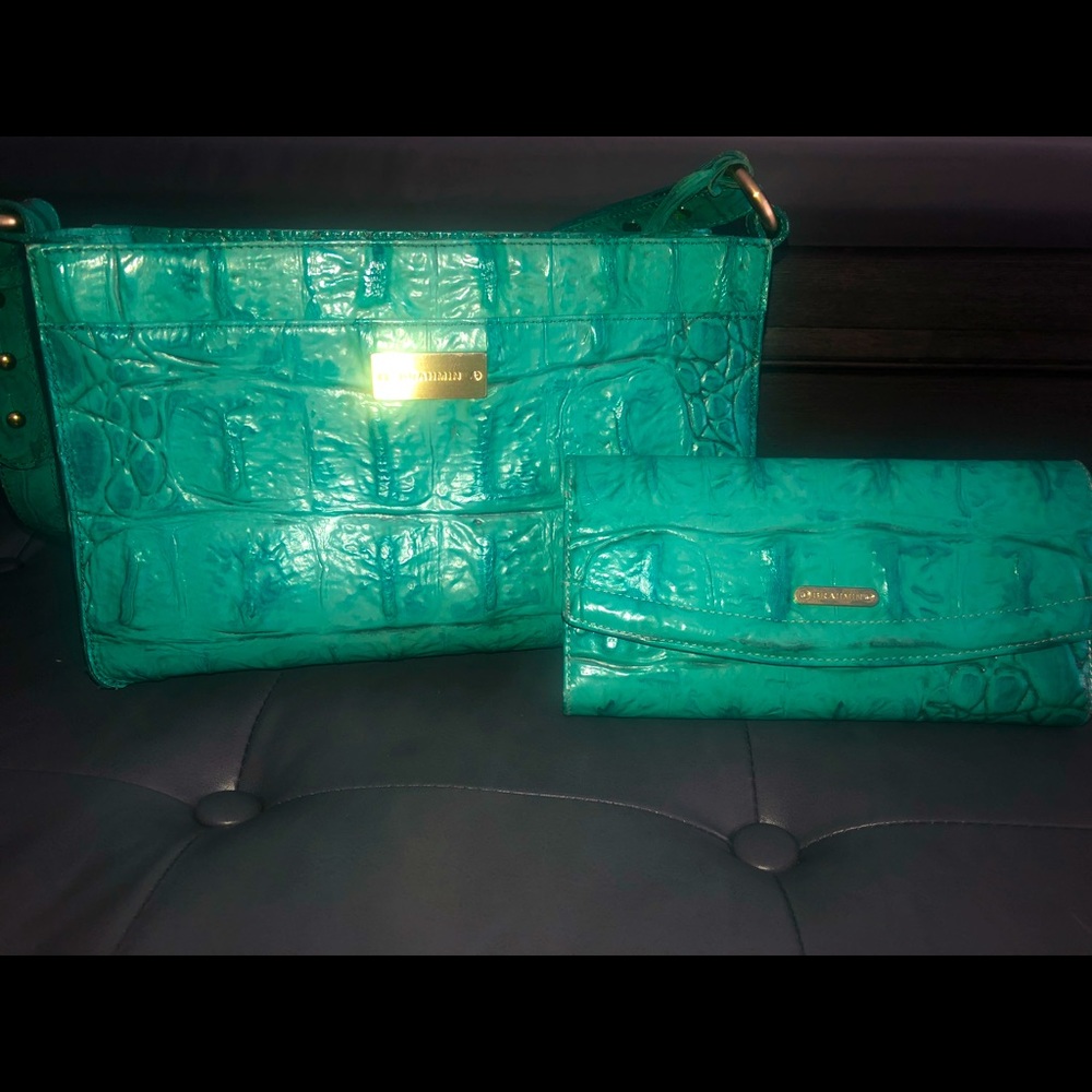 Beautiful gently used Brahmin Orinoco purse in teal green with matching wallet